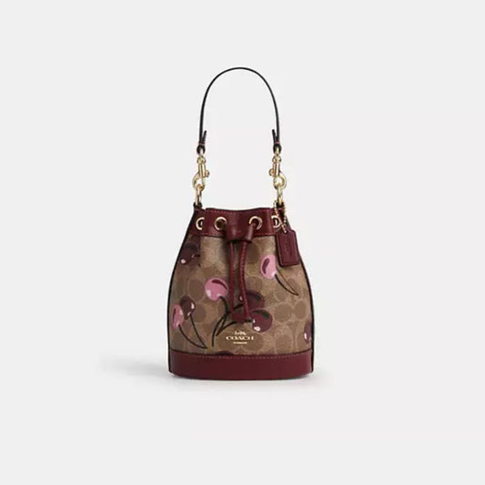 Mini Bucket Bag In Signature Canvas With Cherry Print